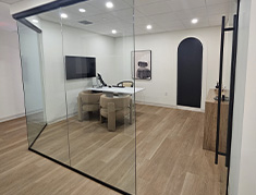 Oral surgeon looking at x rays of a patient's jaws on a computer