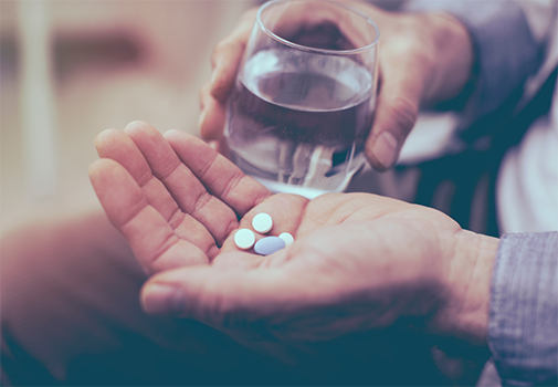 Person taking pills
